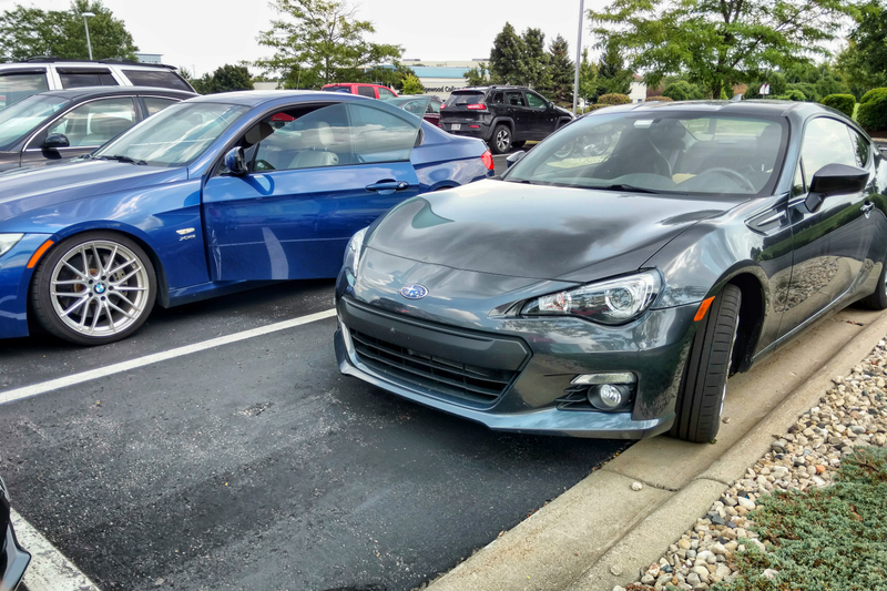 Illustration for article titled Coworker's Subieyota left enough room for me to open my car's gigantic doors!